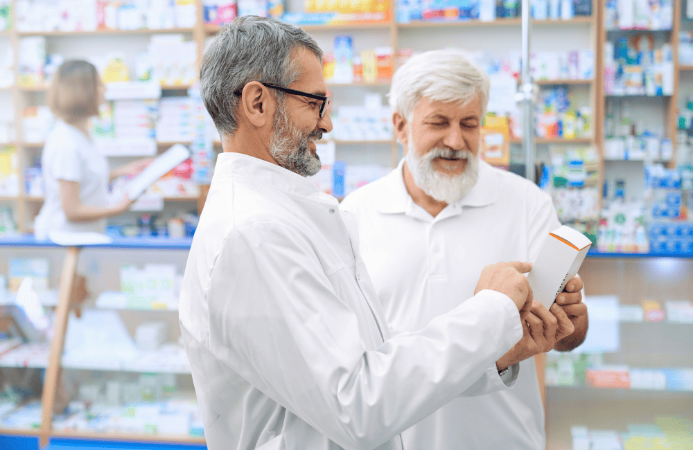 chemist-explaining-prescription-senior-man-drugstore